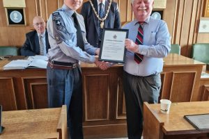 Town Mayor 2023-24 presenting Air Cadet with his Certificate of Appreciation