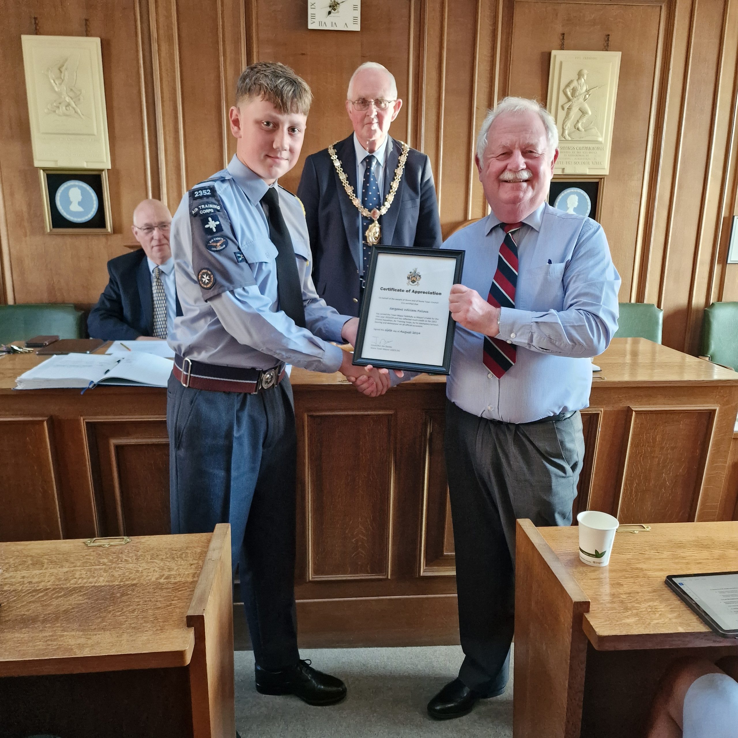 Town Mayor 2023-24 presenting Air Cadet with his Certificate of Appreciation