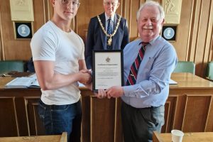 Town Mayor 2023-24 presenting Army Cadet with his Certificate of Appreciation